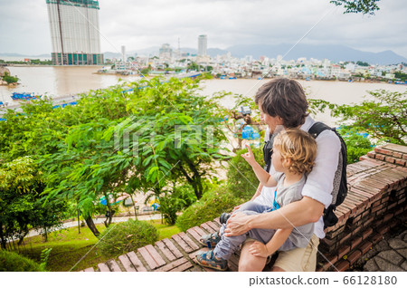 Father and Toddler Son tourists in Vietnam. Po Nagar Cham Tovers. Asia Travel concept. 66128180