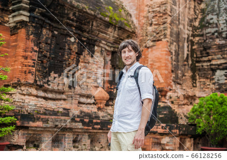 Man tourist in Vietnam. Po Nagar Cham Tovers. Asia Travel concept. Man tourist in Vietnam. Po Nagar Cham Tovers. Asia Travel concept. 66128256