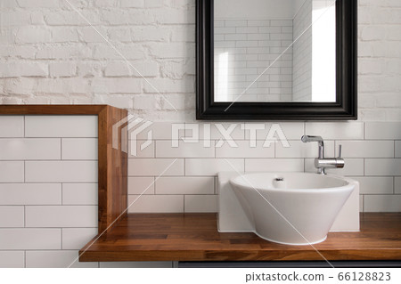 Interior of comfortable light bathroom with simple design 66128823