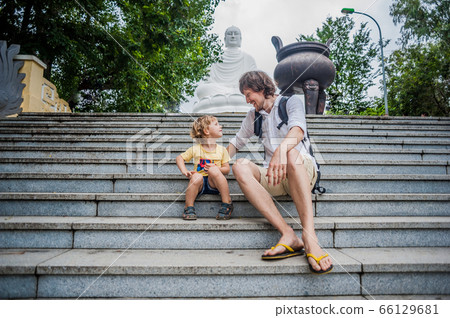 Happy tourists dad and son in LongSon Pagoda Happy tourists dad and son in LongSon Pagoda 66129681