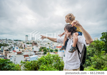 Happy tourists dad and son in LongSon Pagoda Happy tourists dad and son in LongSon Pagoda 66129686