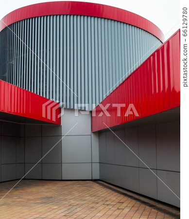 Modern building. Gray and red metal walls. Modern building. Gray and red metal walls. 66129780