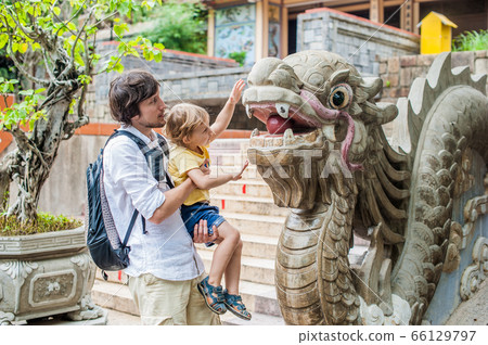 Happy tourists dad and son in LongSon Pagoda Happy tourists dad and son in LongSon Pagoda 66129797