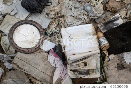 Clock without numerals in the garbage. Clock without numerals in the garbage. 66130096