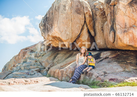 Mother and son travelers at the Hon Chong cape, Garden stone, popular tourist destinations at Nha Trang. Vietnam 66132714
