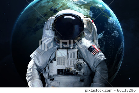 Astronaut with the Earth behind Astronaut with the Earth behind 66135290