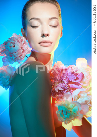 Young beautiful woman with bouquet of roses. Young beautiful woman with bouquet of roses. 66135653