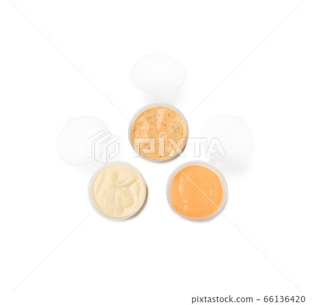 Three dip sauces in a plastic take away container 66136420