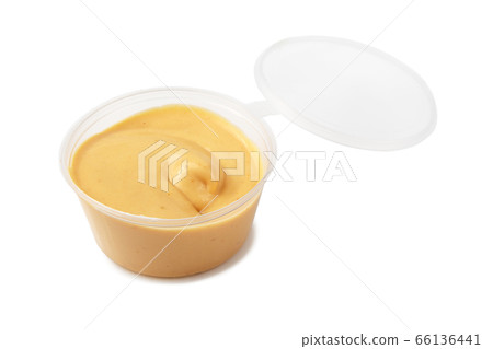 Dip sauce in a plastic take away container 66136441