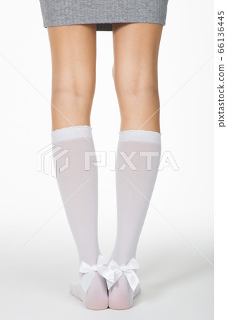 Back view of beautiful female legs in white knee Back view of beautiful female legs in white knee 66136445