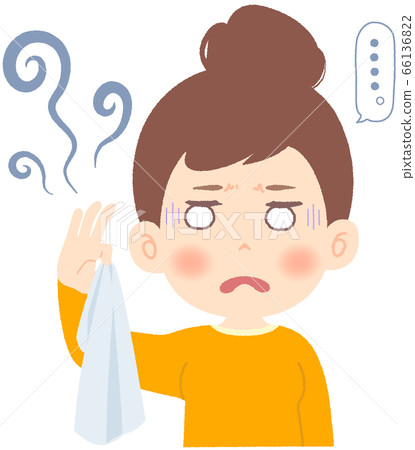 一個女人用手指撿起有異味的衣服並講話 66136822