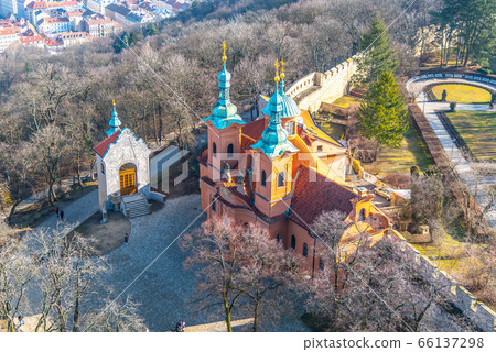 Church of Saint Lawrence, Czech: Kostel Svateho Vavrince, on Petrin Hill. Aerial view from Petrin Tower, Prague, Czech Republic 66137298