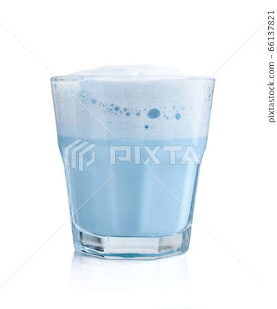 Blue matcha latte in glass isolated 66137821