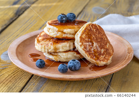 Stack of ricotta pancakes on the plate Stack of ricotta pancakes on the plate 66140244