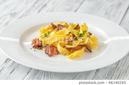 Pappardelle pasta with pancetta Pappardelle pasta with pancetta 66140265