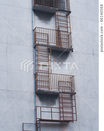 Fire exit ladder outside the building.  66140568