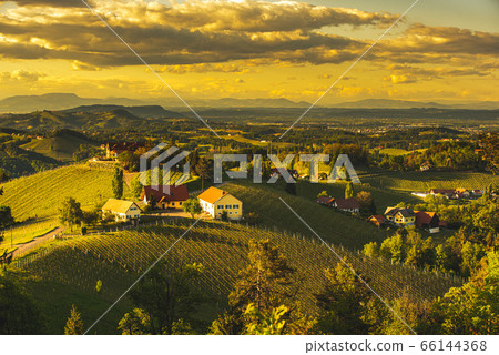 Sunset over South Styria vineyard landscape in Sunset over South Styria vineyard landscape in 66144368