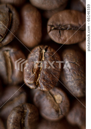 Extremely close-up background roasted coffee beans 66146389