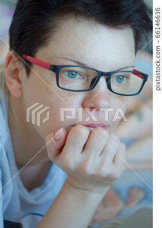 Eyewear glasses woman closeup portrait looking at 66146636