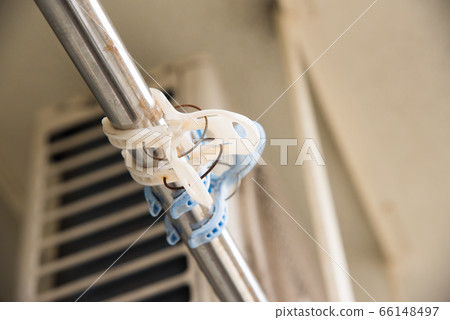 Blue clothespins and clothesline up Blue clothespins and clothesline up 66148497