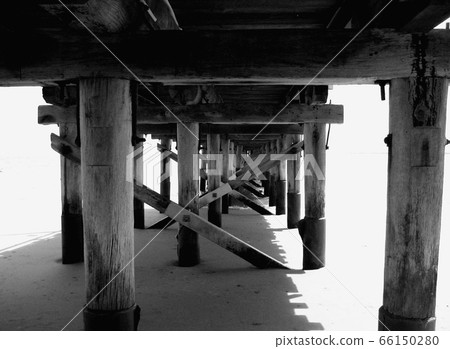 A long bridge at the beach 66150280