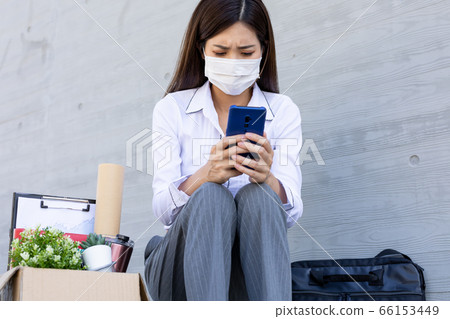 Asian woman being fired Asian woman being fired 66153449