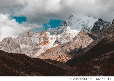 Colorful in autumn forest and snow mountain at 66154015