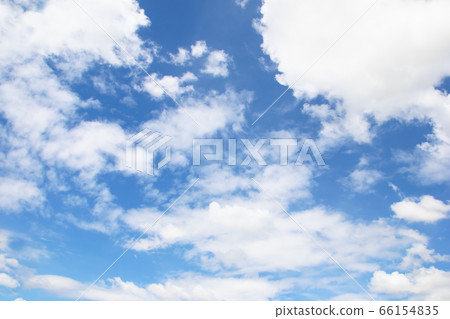 Bright blue sky with white clouds 66154835
