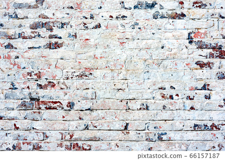 Texture of a brick wall with cracks and scratches Texture of a brick wall with cracks and scratches 66157187