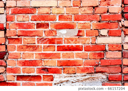 Texture of a brick wall with cracks and scratches Texture of a brick wall with cracks and scratches 66157204