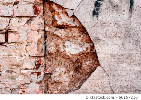 Texture of a brick wall with cracks and scratches Texture of a brick wall with cracks and scratches 66157210