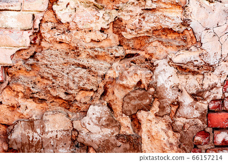 Texture of a brick wall with cracks and scratches Texture of a brick wall with cracks and scratches 66157214