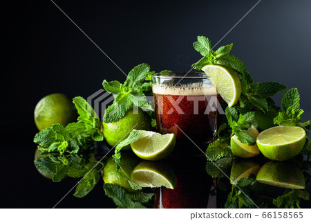 Carbonated drink or cocktail with limes and mint Carbonated drink or cocktail with limes and mint 66158565