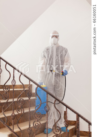 Man spreading chemical 66160051