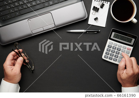 Top view of businessman's hands working. Modern 66161390