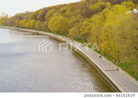 Moskva River embankment, Gorky Park (Neskuchny Garden) are popular place for walking of citizens. Coronavirus pandemic time. Nature is beautiful. No people. Rest for nature. View from above/ top view Moskva River embankment, Gorky Park (Neskuchny Garden) are popular place for walking of citizens. Coronavirus pandemic time. Nature is beautiful. No people. Rest for nature. View from above/ top view 66161629