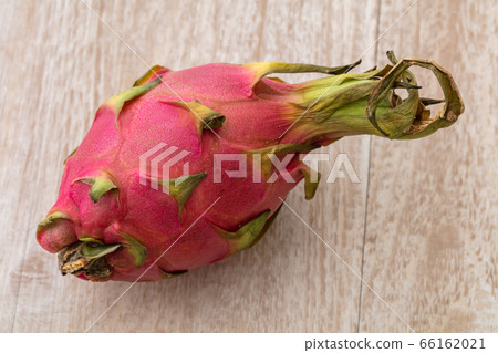 Dragonfruits with tropical fruits on top of trees 66162021
