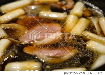 Duck pan with leek and duck meat Duck pan with leek and duck meat 66168474