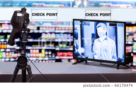 People using  thermoscan camera or infrared thermometer to measure body temperature for Coronavirus (CoVID-19) flu patient with high temperature fever in check point area before access to shopping mal 66170474