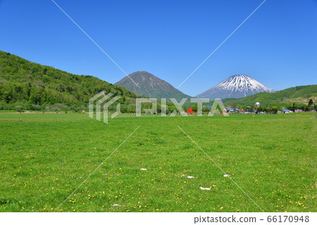 Take a picture of Mt. Yotei and Mt. Shiribetsu from the ranch Takara in Kimobetsu-cho, Hokkaido Take a picture of Mt. Yotei and Mt. Shiribetsu from the ranch Takara in Kimobetsu-cho, Hokkaido 66170948