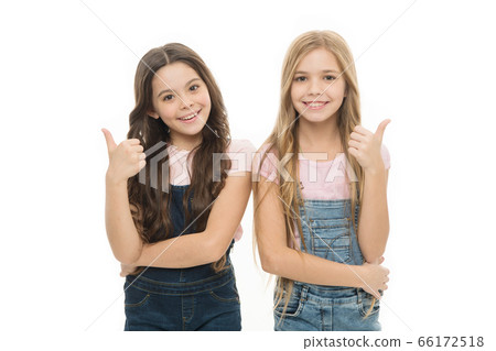 Sisters kids isolated white background. Sisterly Sisters kids isolated white background. Sisterly 66172518