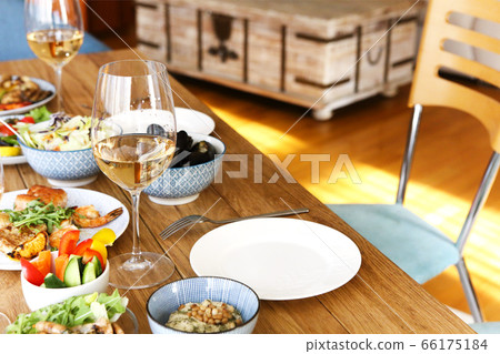 Festive table served for home dinner Festive table served for home dinner 66175184
