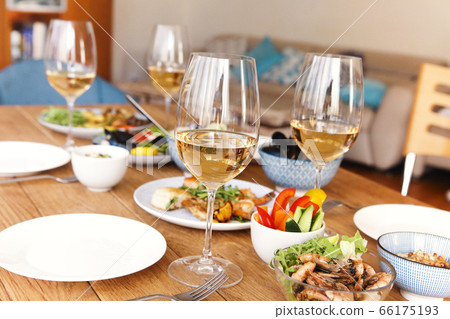 Festive table served for home dinner 66175193