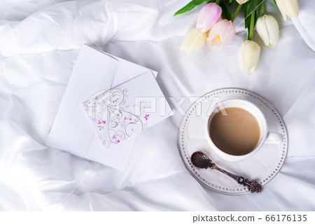 Pink tulips and coffee cup Pink tulips and coffee cup 66176135