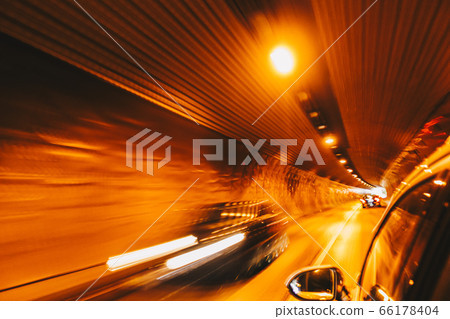 Blurred High-speed car in the tunnel with abstract concept Blurred High-speed car in the tunnel with abstract concept 66178404