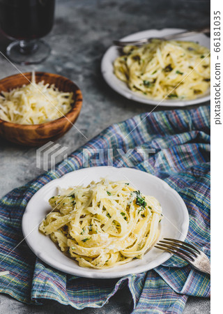 Fettuccine Alfredo on Plate Fettuccine Alfredo on Plate 66181035
