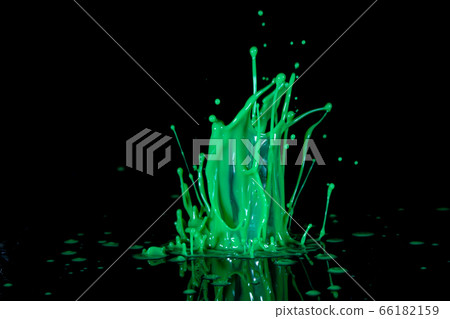 Color ink splash on a black background Color ink splash on a black background 66182159