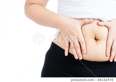 Fat woman holding excessive fat belly, overweight Fat woman holding excessive fat belly, overweight 66182478