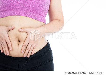Fat woman holding excessive fat belly, overweight Fat woman holding excessive fat belly, overweight 66182493