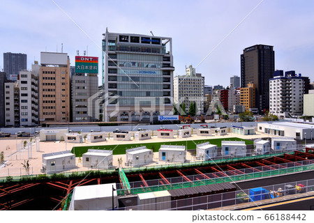 In front of Takanawa gateway station where maintenance work continues 66188442